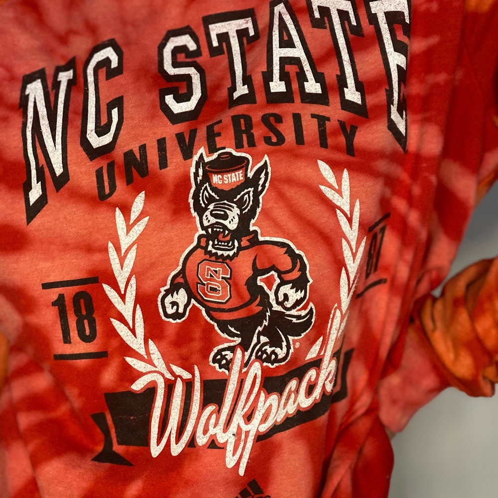 Custom bleach dye NC state crewneck sweatshirt.